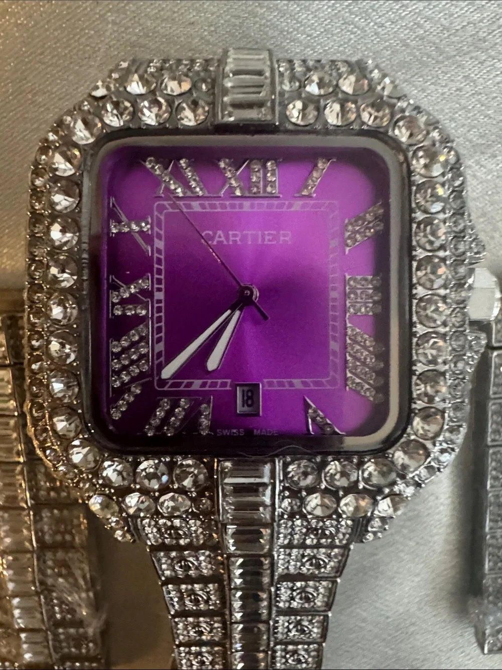 New! Iced-Out bustdown watch featuring a vibrant purple dial and Moissinite vvs1